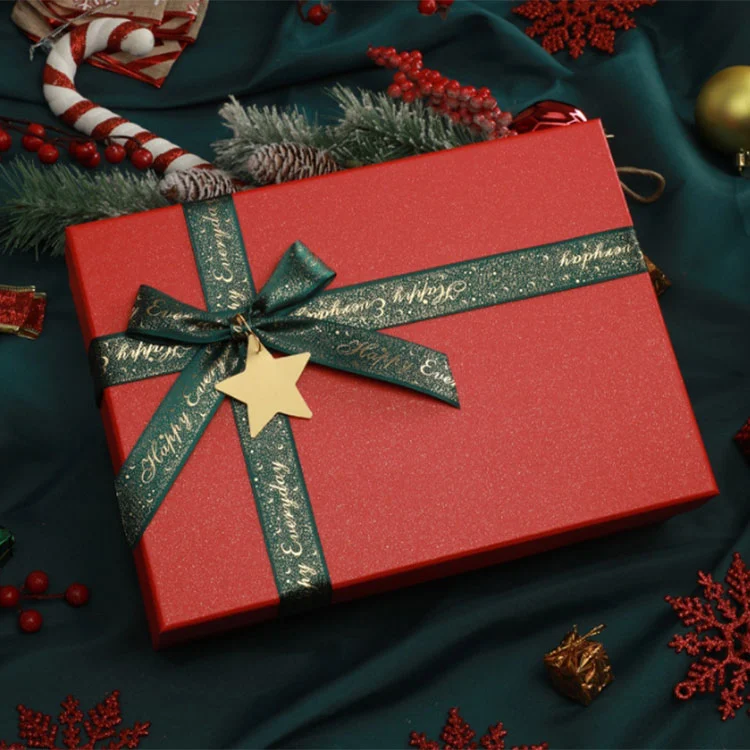 Jul styvt lock och bas presentförpackning med band och stjärnberlock