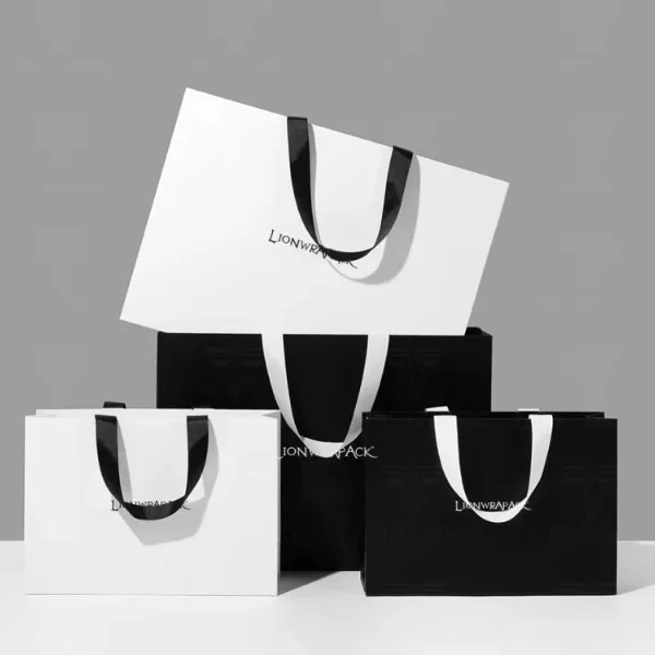 Tryckt lyxpapperspåse Luxury Present Papperspåsar OEM Logo Handväska shoppingväska